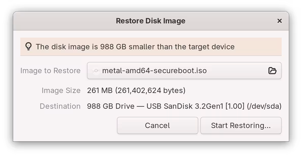 A dialog for restoring disk image. "metal-amd64-secureboot.iso" is selected as an image to restore.